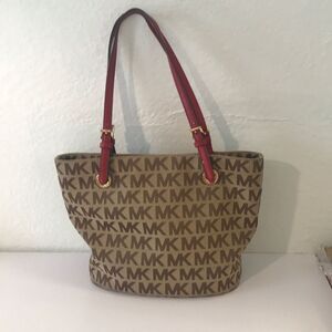 Michael Kors neutral tote with red straps